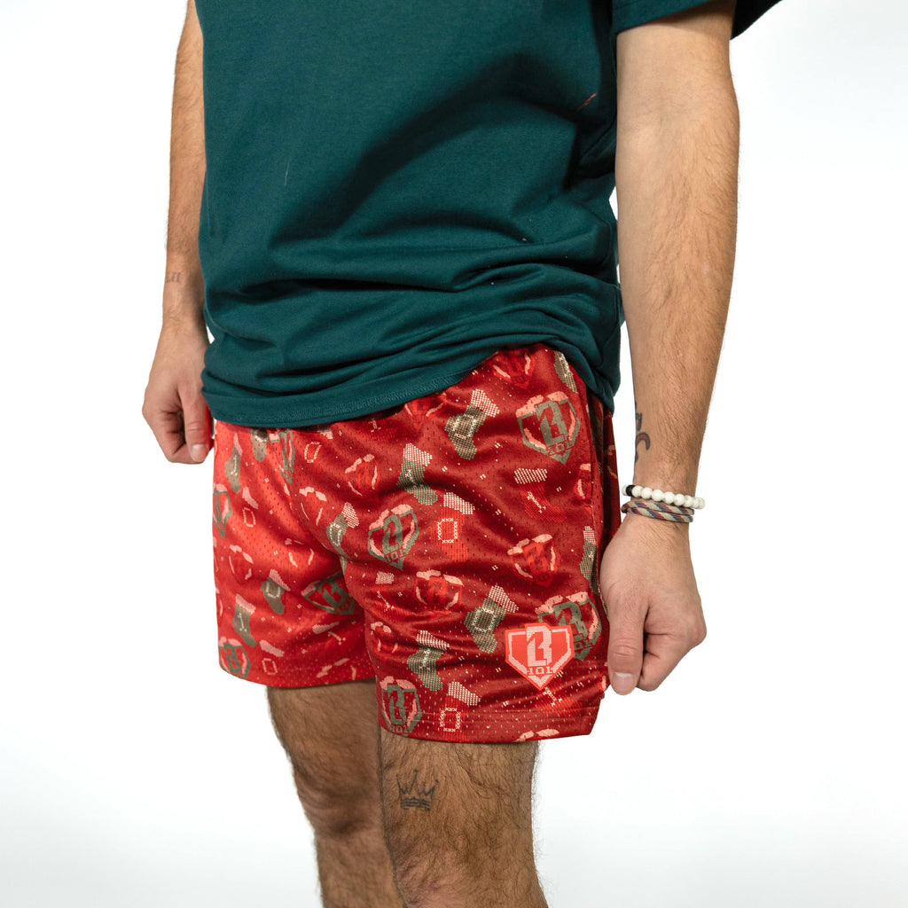 Adult model wearing red Stitched For The SZN shorts