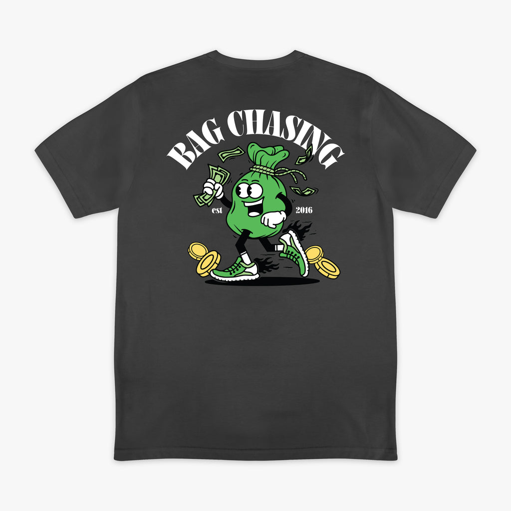 Black t-shirt with a graphic design of a green bag chasing money and 'Bag Chasing' text on a white background