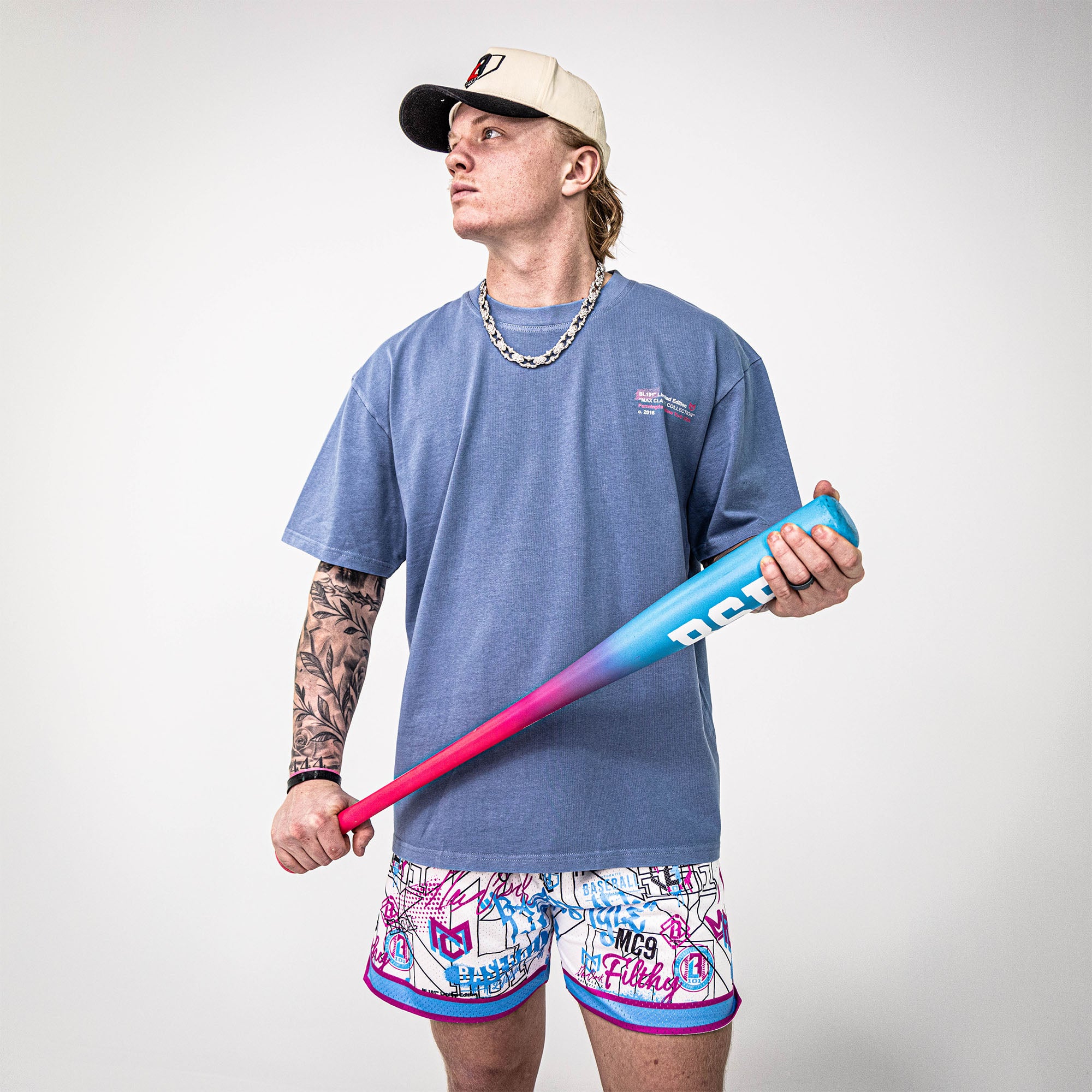 Adult model wearing shorts with “Time 2 Shine Icons” design