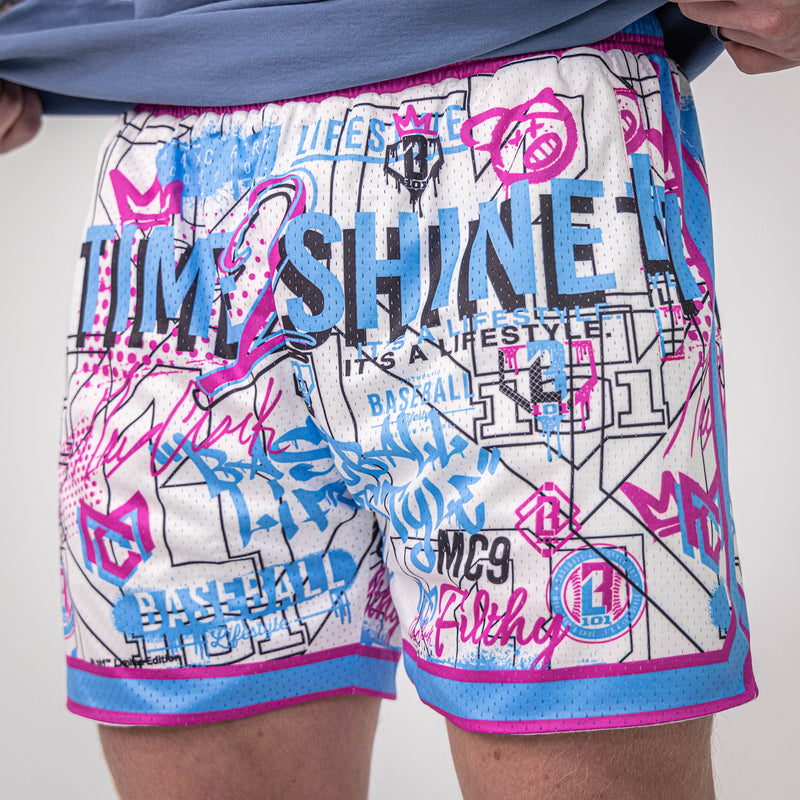 Adult model wearing shorts with “Time 2 Shine Icons” design