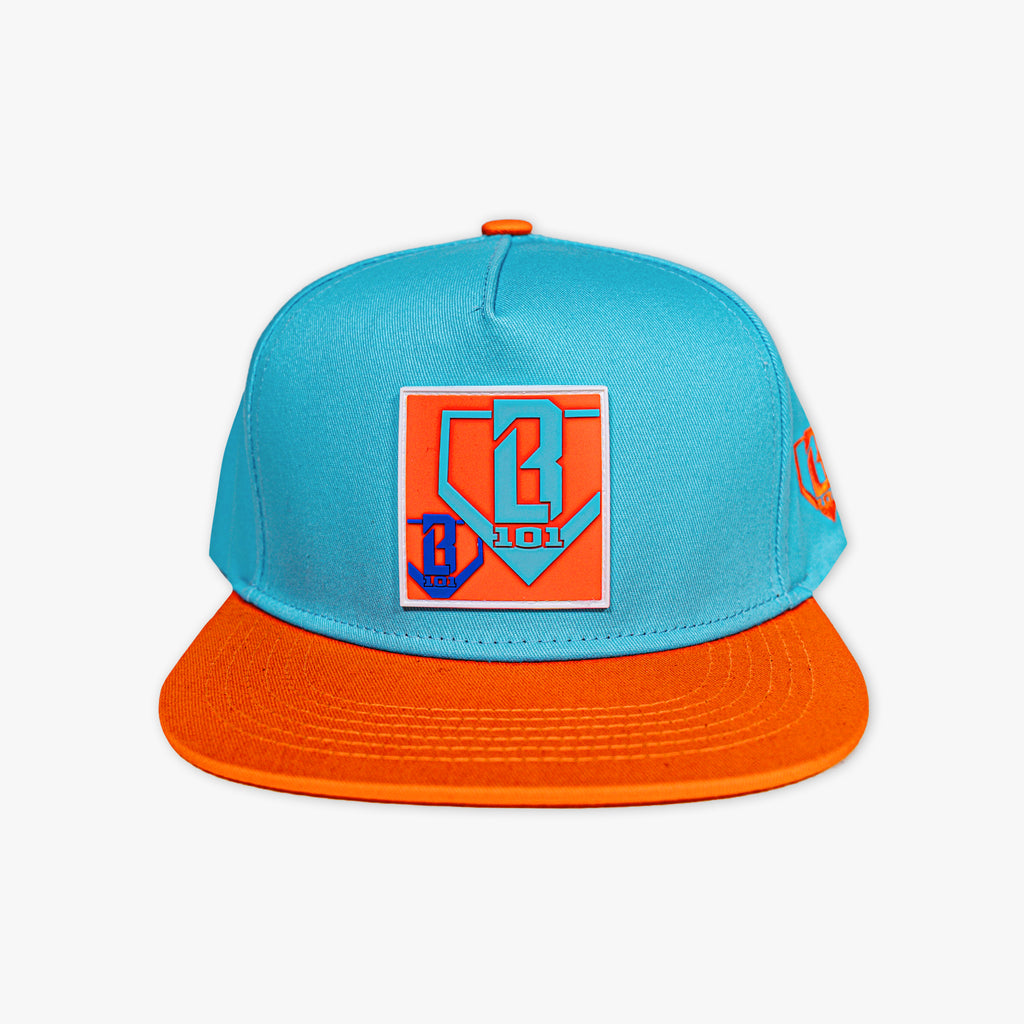 Adult model wearing blue hat with "Trash Talk" design