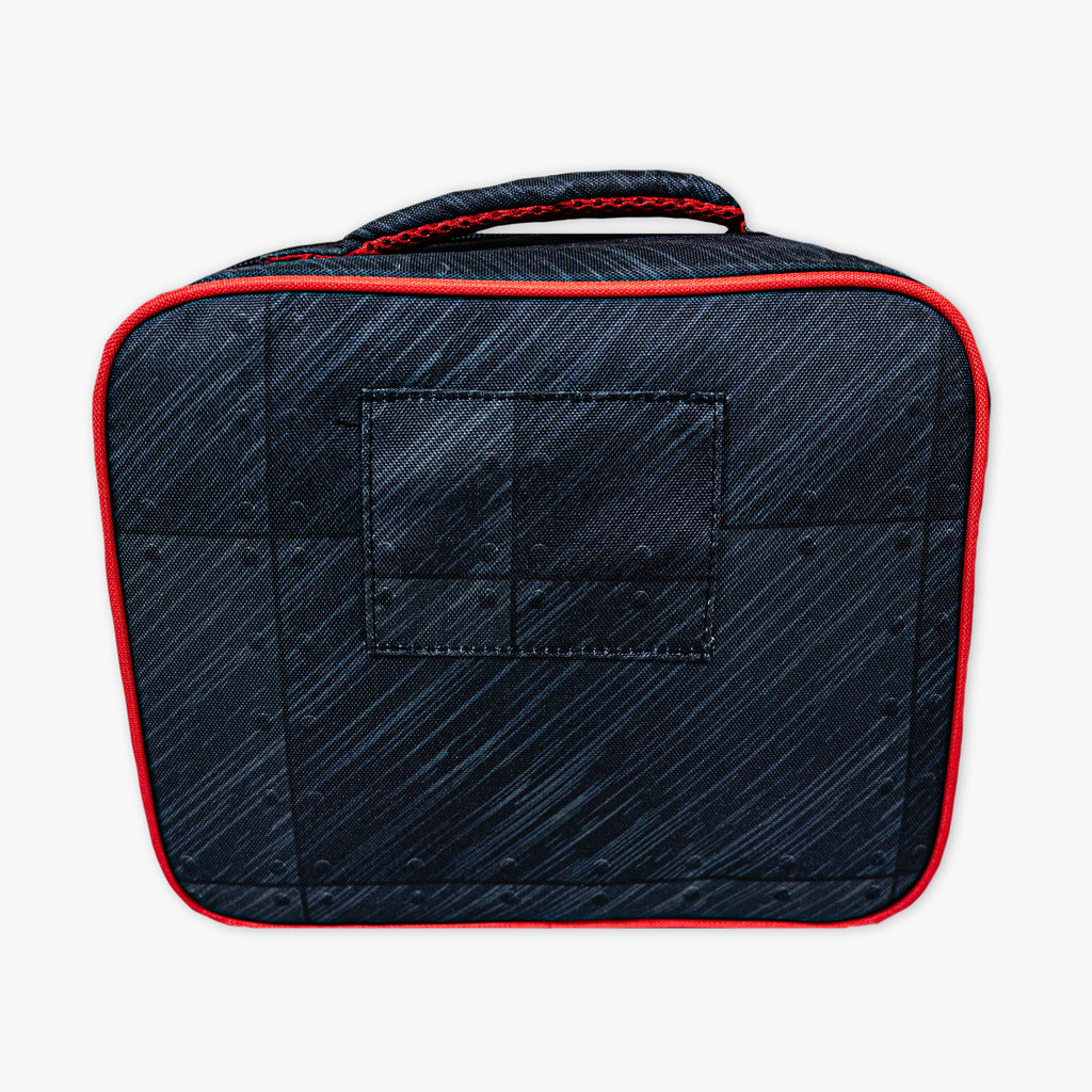 Adult model wearing multi-color lunch box with "Unit 101 SZN 2" design