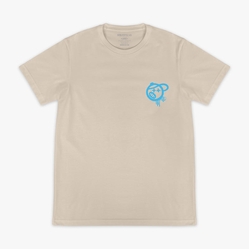 Tan and light blue Vandal graphic tee — front view