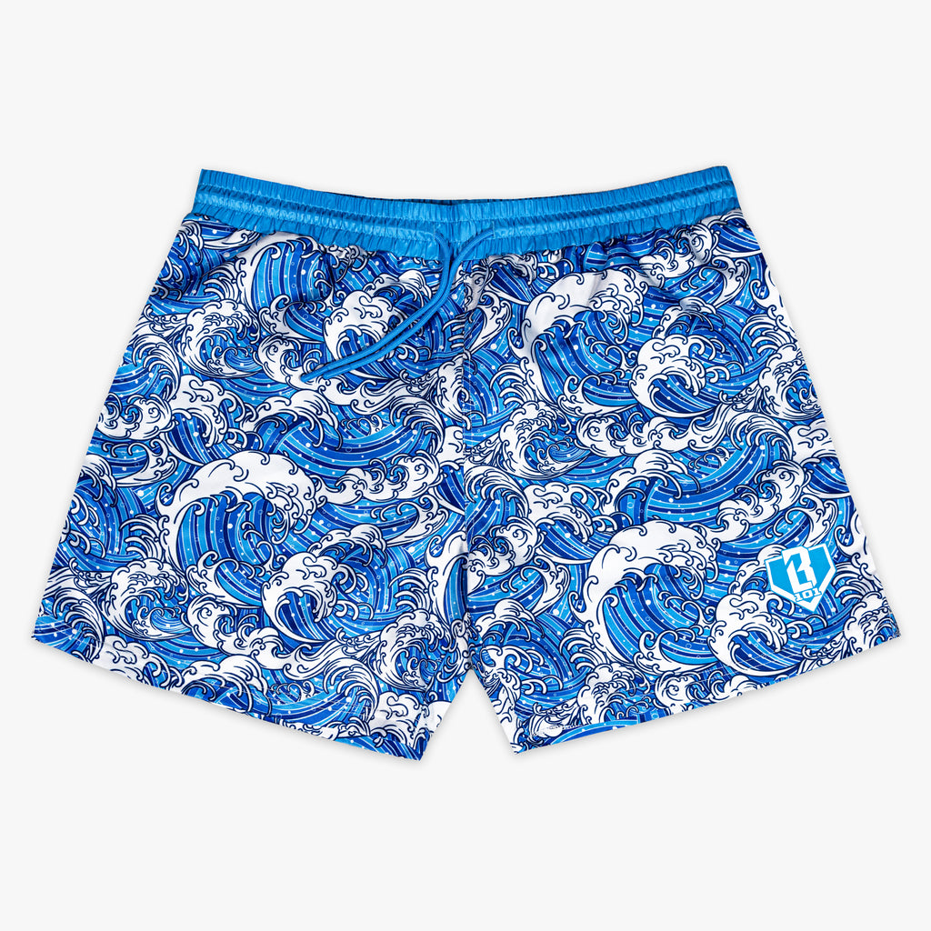 Blue and white wave patterned shorts on a white background