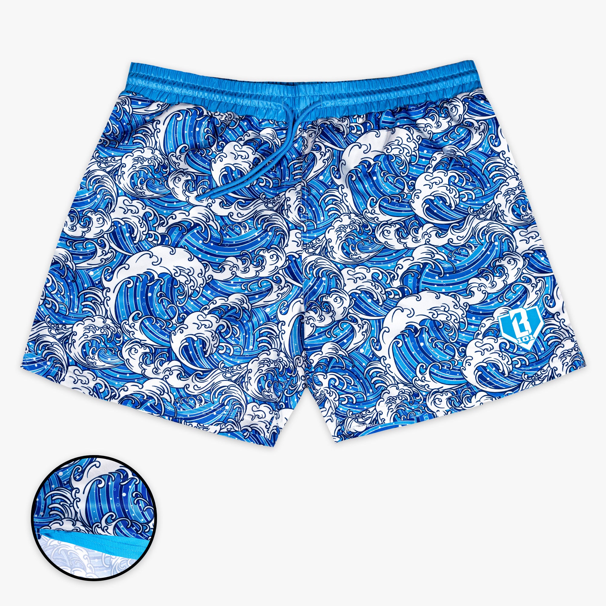 Blue and white wave patterned shorts on a white background