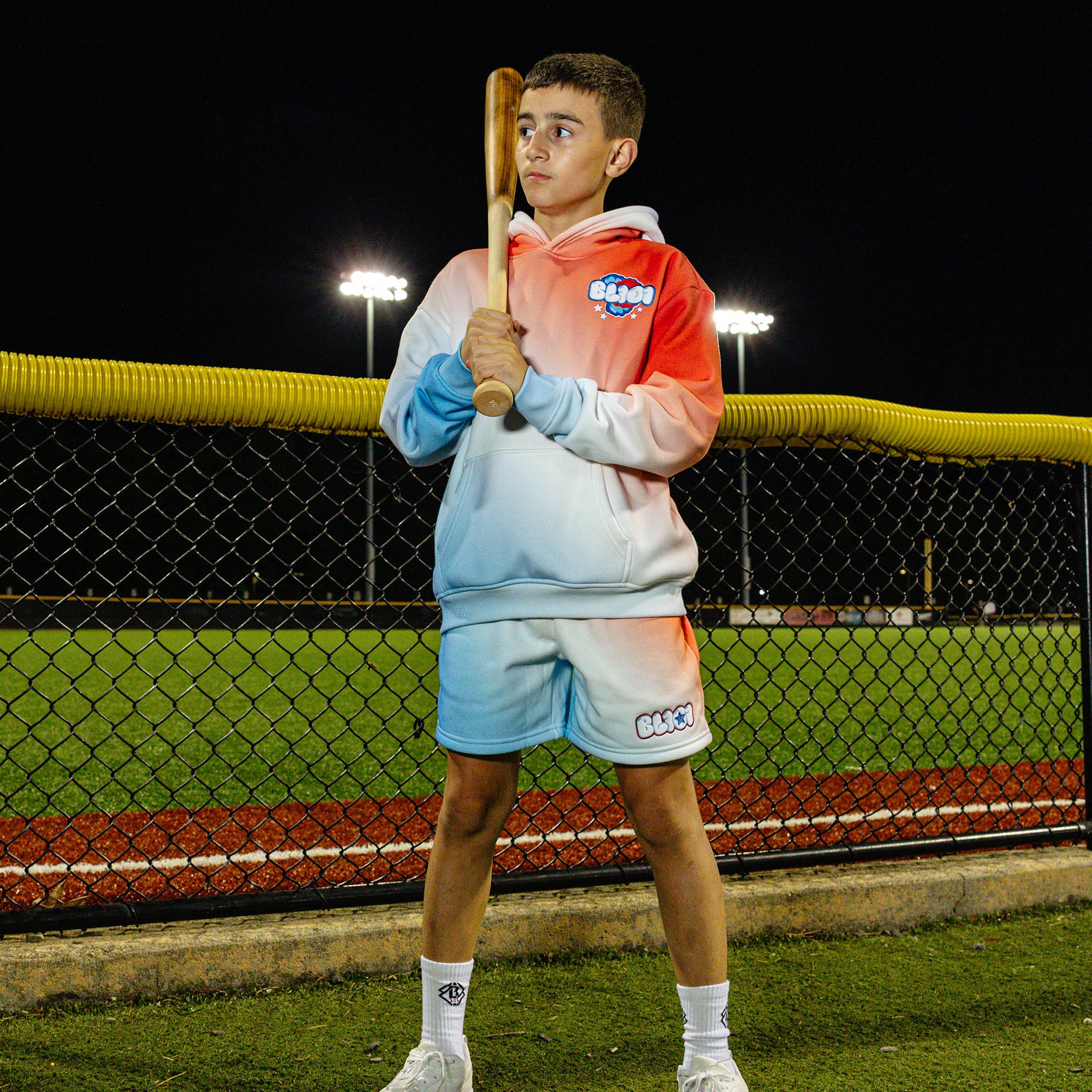 Youth model wearing red, white & blue Cotton Candy Sweatshorts USA youth shorts