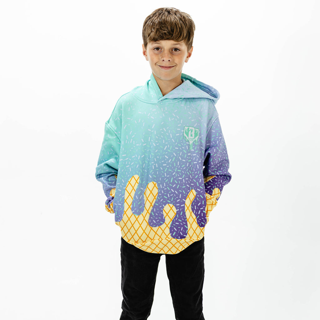 Youth model wearing multi-color Ice Cream Galaxy Grape youth hoodie with "Ice Cream" design