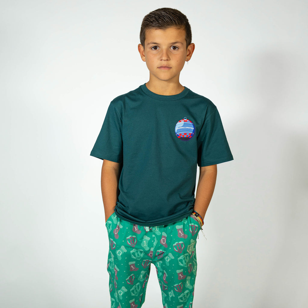 Youth model wearing green Stitched For The SZN youth pajama pants