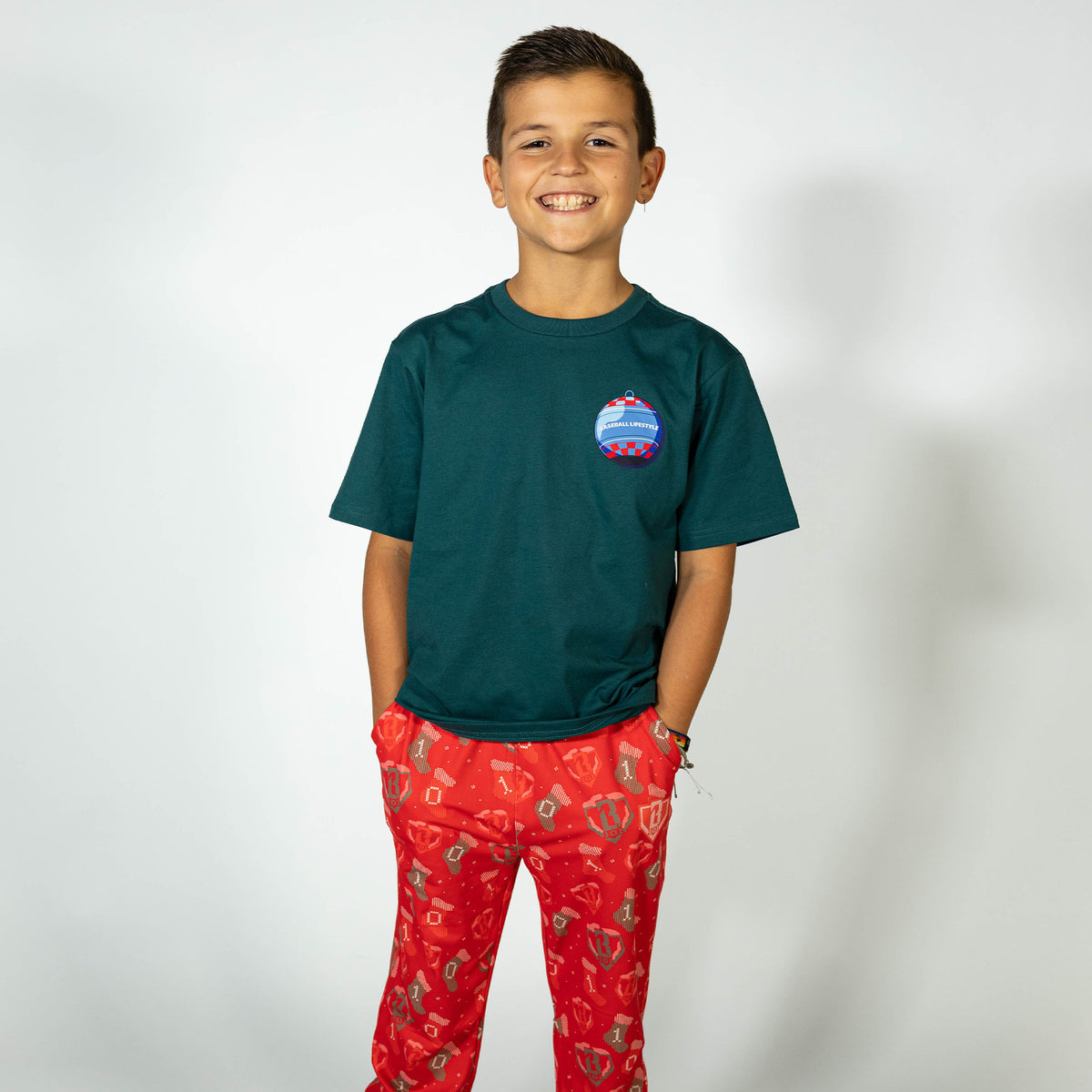 Youth model wearing red Stitched For The SZN youth pajama pants
