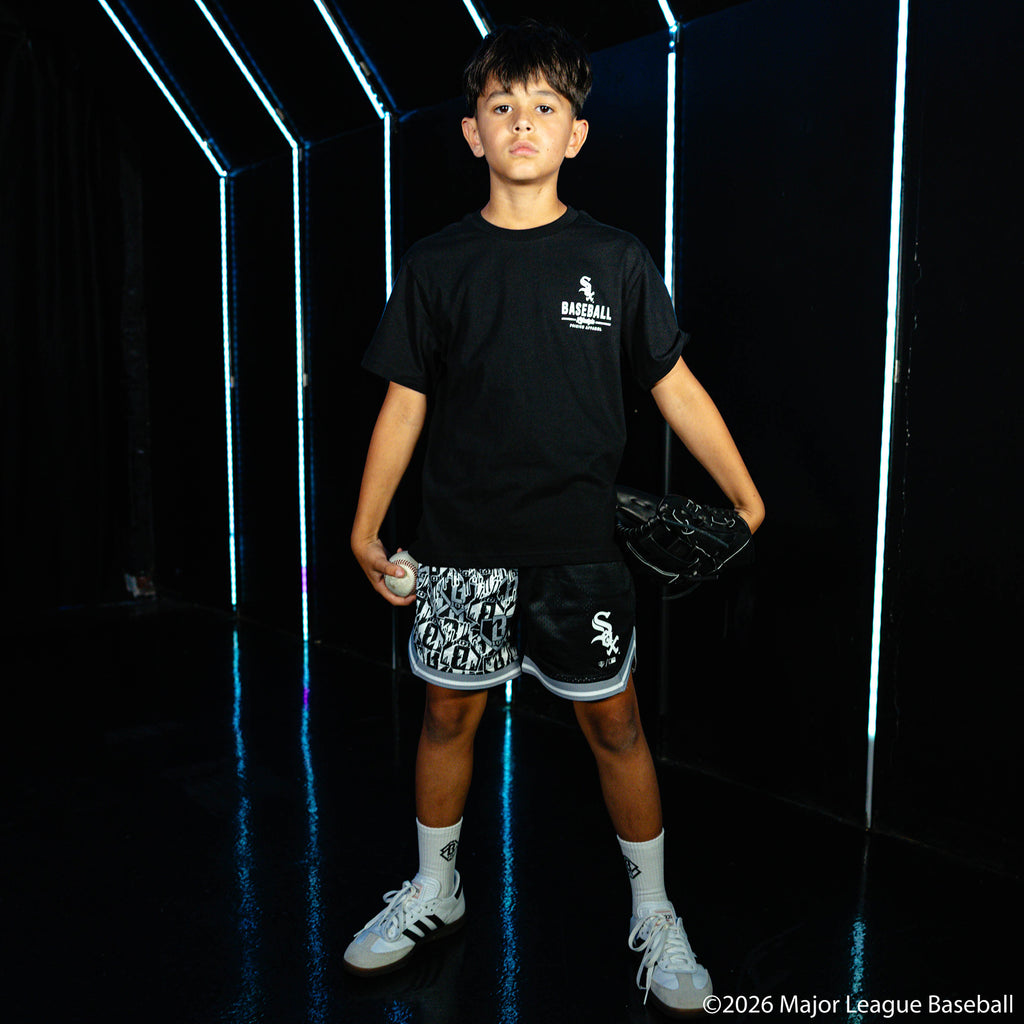 Youth model wearing black youth graphic tee with "Chicago White Sox Ice Cream" design