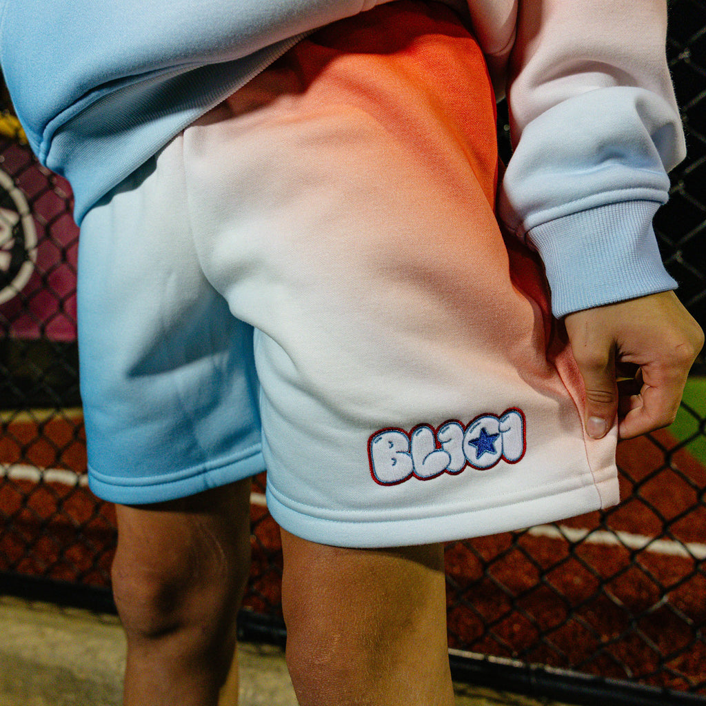 Youth model wearing red, white & blue Cotton Candy Sweatshorts USA youth shorts