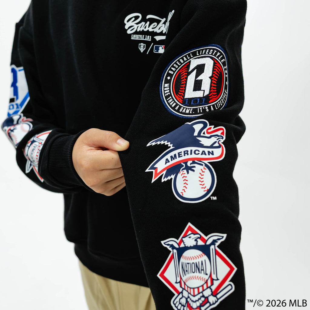 Youth model wearing black BL101 x MLB Established League youth hoodie