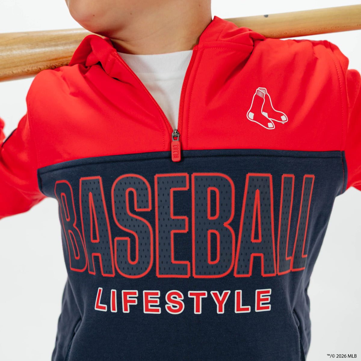 Youth model wearing red Boston Red Sox Color Block youth quarter zip