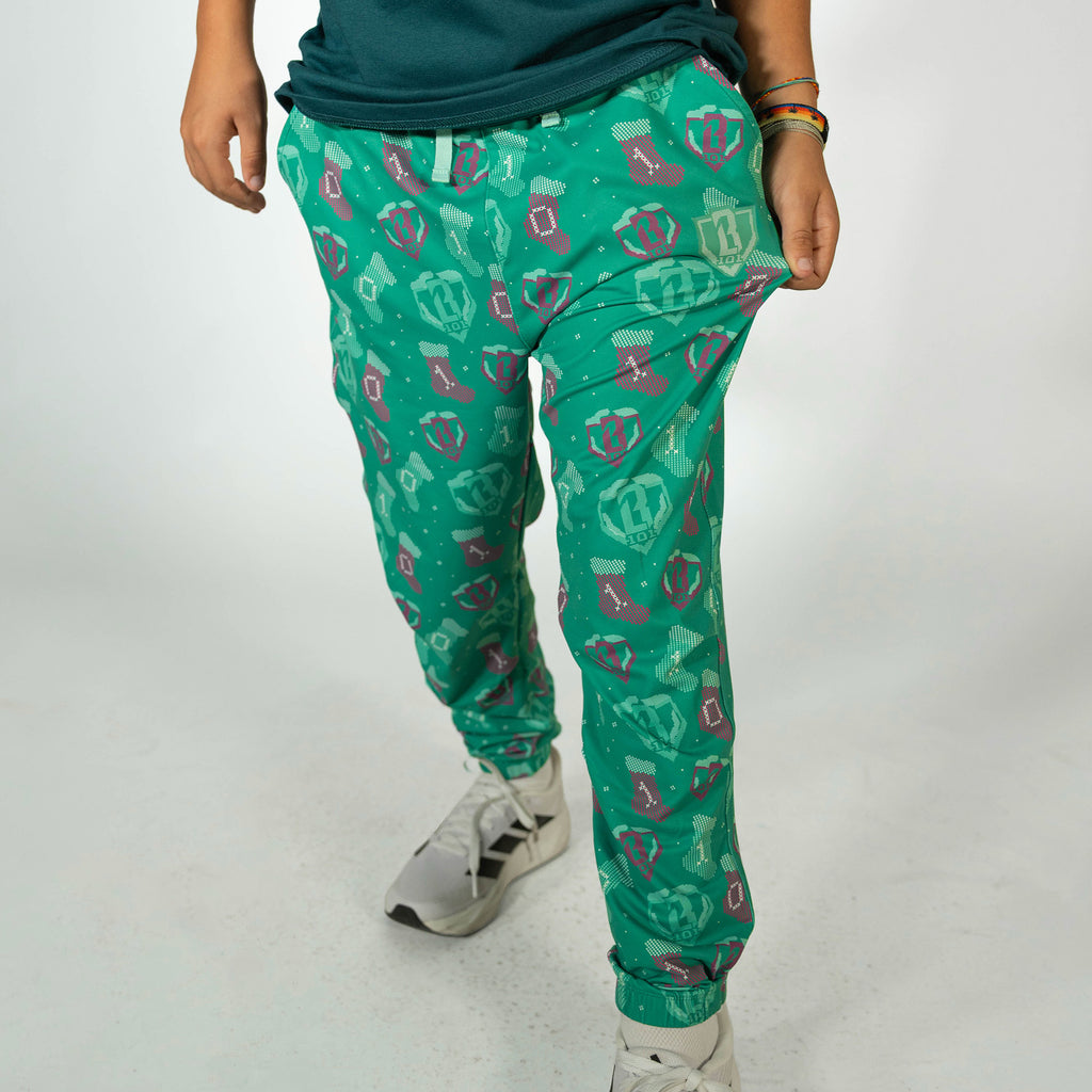 Youth model wearing green Stitched For The SZN youth pajama pants