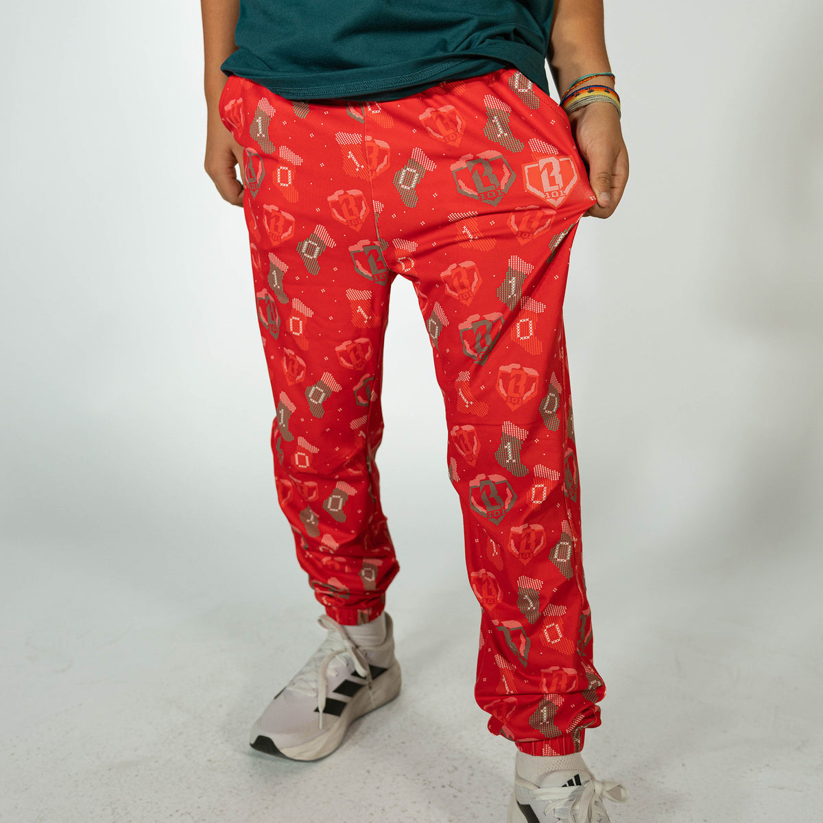 Youth model wearing red Stitched For The SZN youth pajama pants