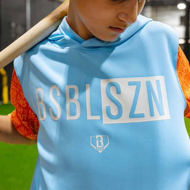 Youth model wearing blue youth short sleeve hoodie with "BSBL-SZN V3 Short Sleeve Youth" design