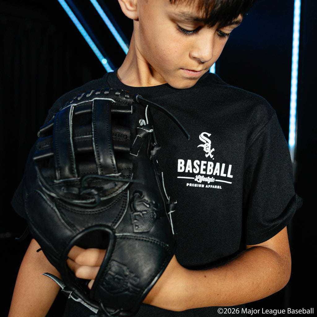 Youth model wearing black youth graphic tee with "Chicago White Sox Ice Cream" design