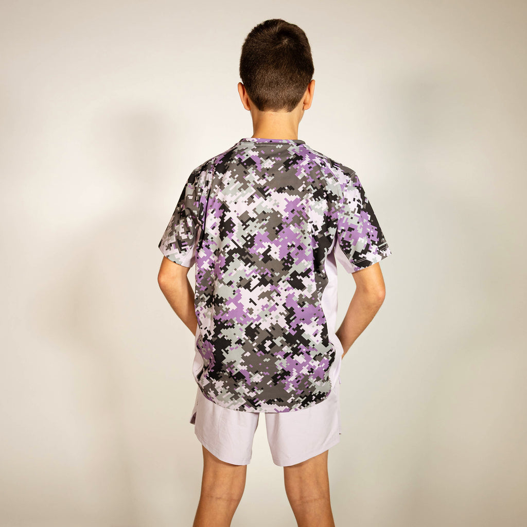 Youth model wearing multi-color Digi Camo Diamond Tech youth vented tee
