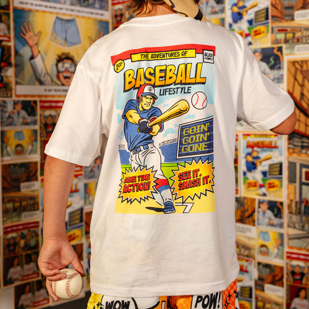 Youth model wearing white youth graphic tee with "Home Run Hero" design
