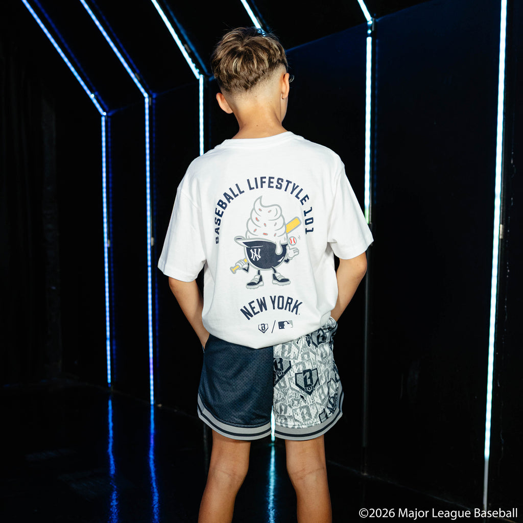 Youth model wearing white youth graphic tee with "New York Yankees Ice Cream" design