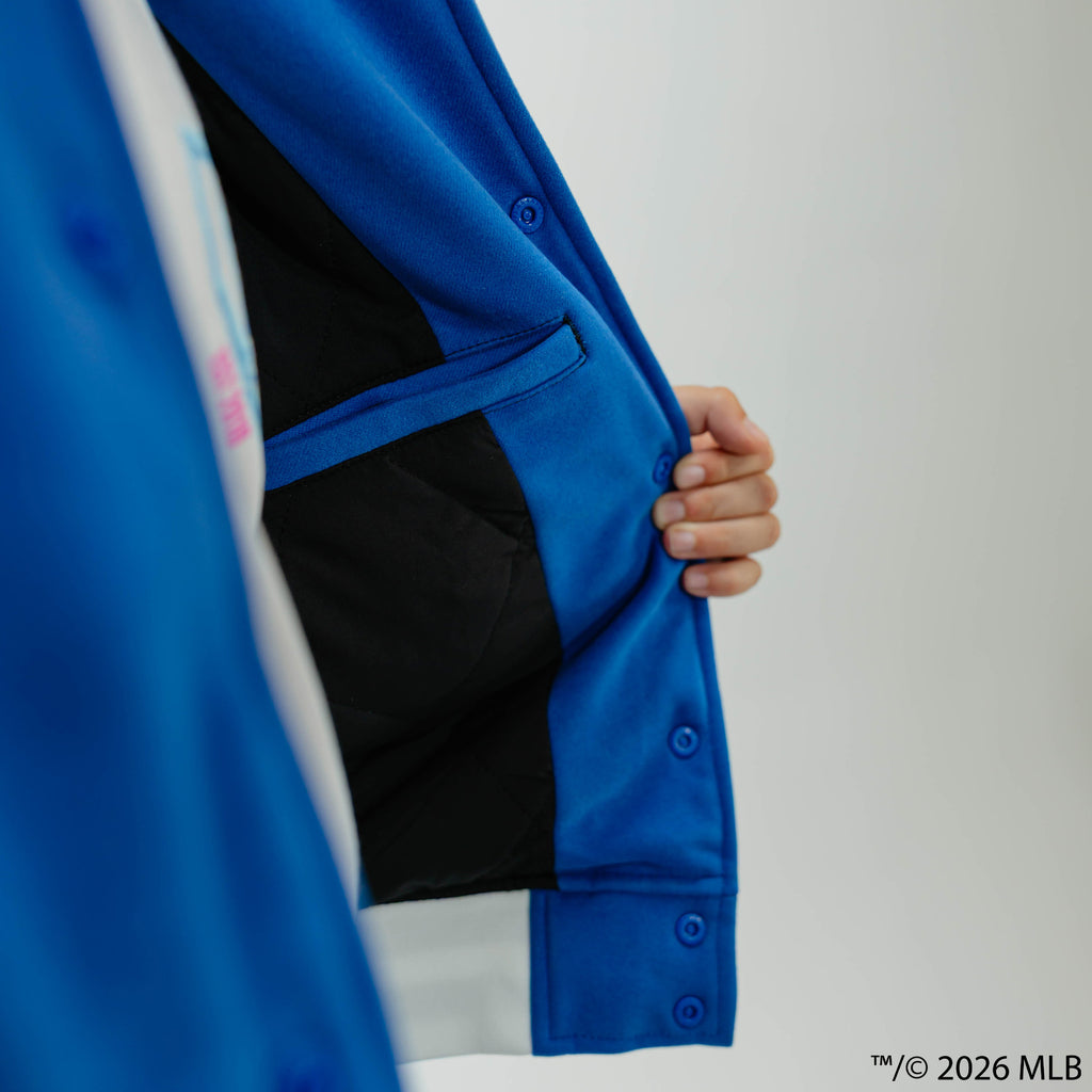 Youth model wearing blue Los Angeles Dodgers Stadium youth bomber jacket