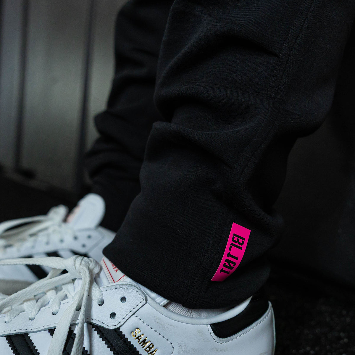 Youth model wearing black relaxed fit joggers with "King Of JUCO Diamond" design