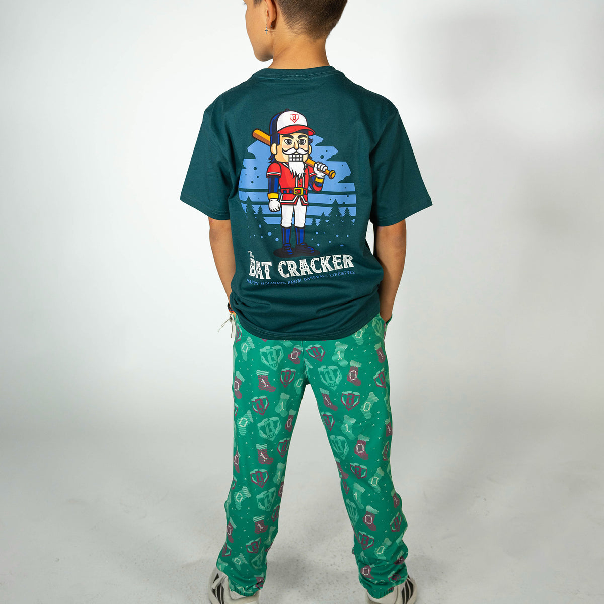 Youth model wearing green Stitched For The SZN youth pajama pants
