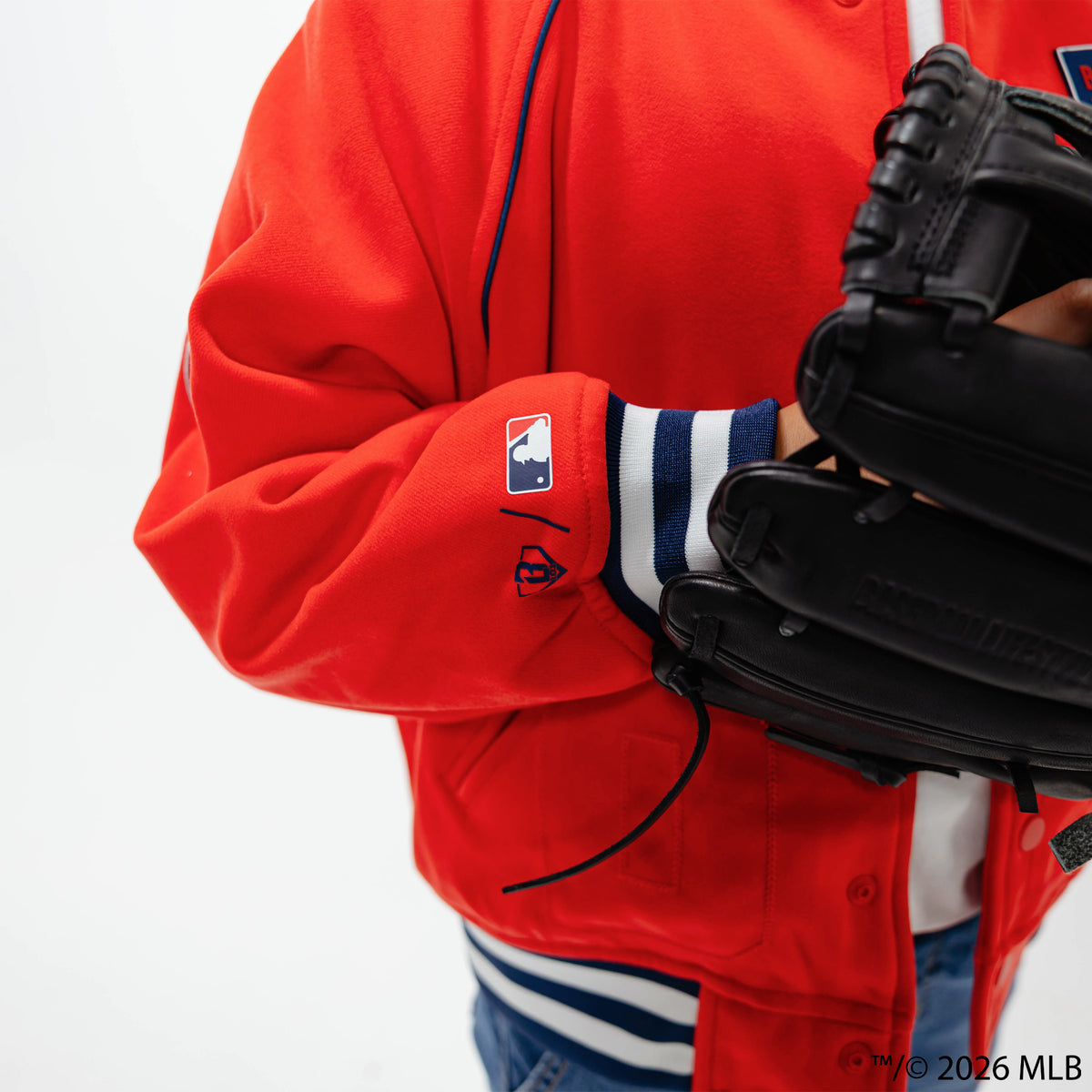 Youth model wearing red Boston Red Sox Stadium youth bomber jacket