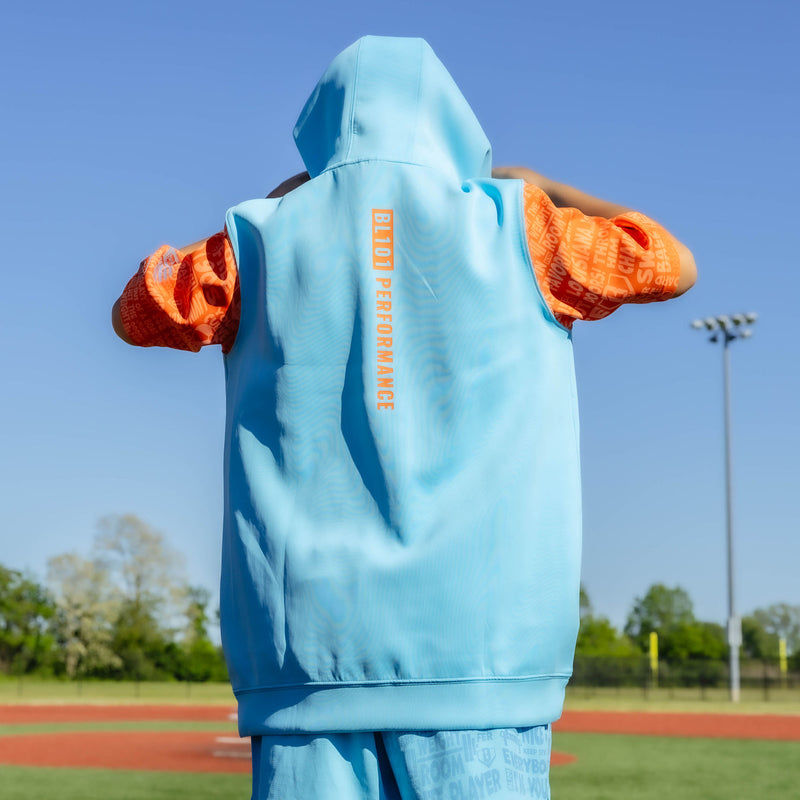 Youth model wearing blue youth short sleeve hoodie with "BSBL-SZN V3 Short Sleeve Youth" design