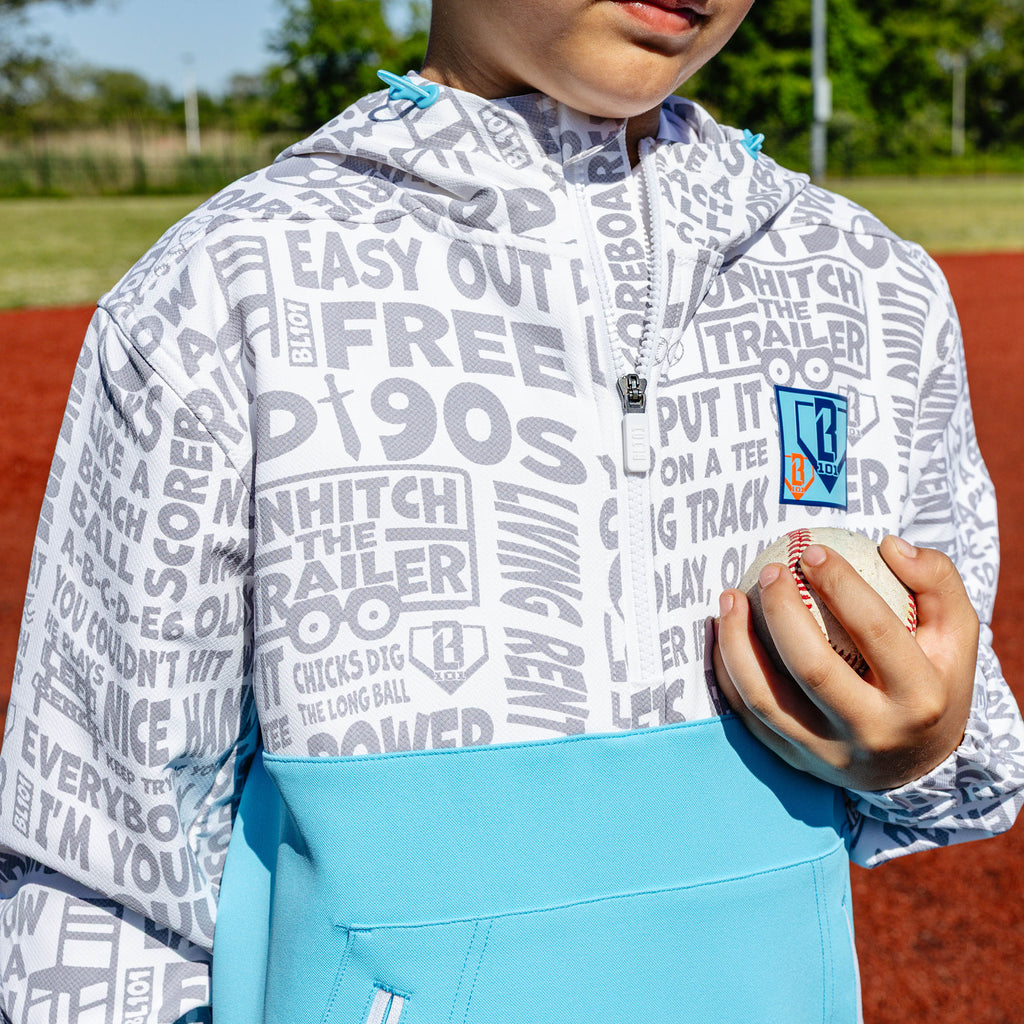 Youth model wearing multi-color youth hoodie with "UVChangeup Trash Talk Youth" design