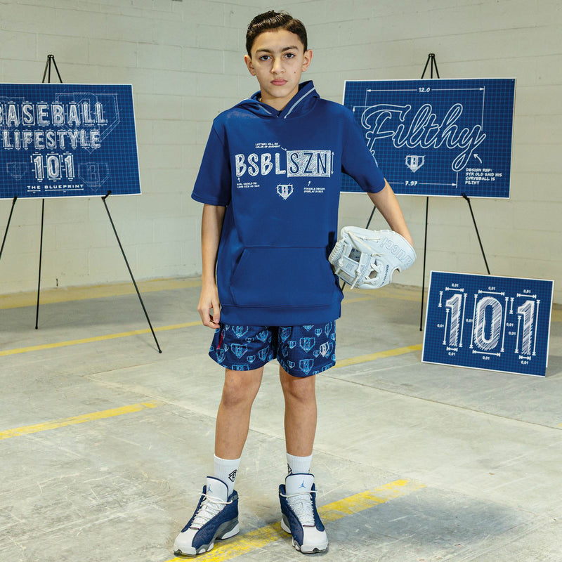 Person wearing a navy shorts sleeve blue hoodie with white blueprint 'BSBL SZN' text 