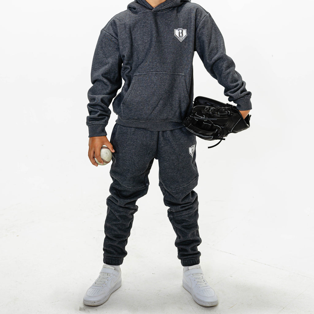 Youth model wearing Gray Baseline joggers