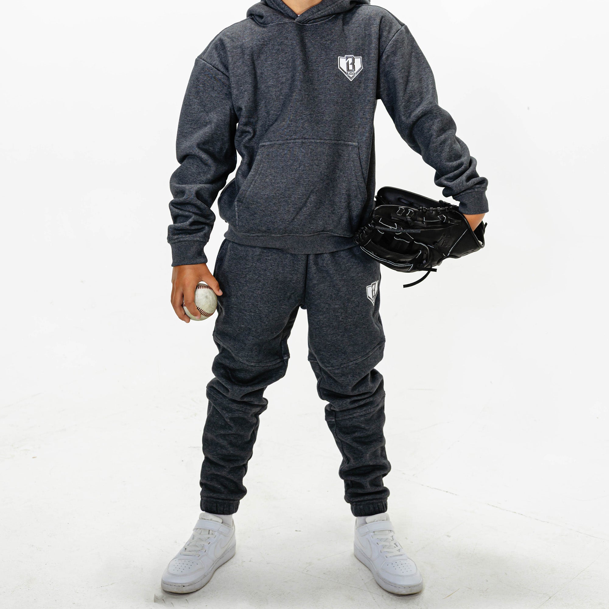 Youth model wearing Gray Baseline joggers