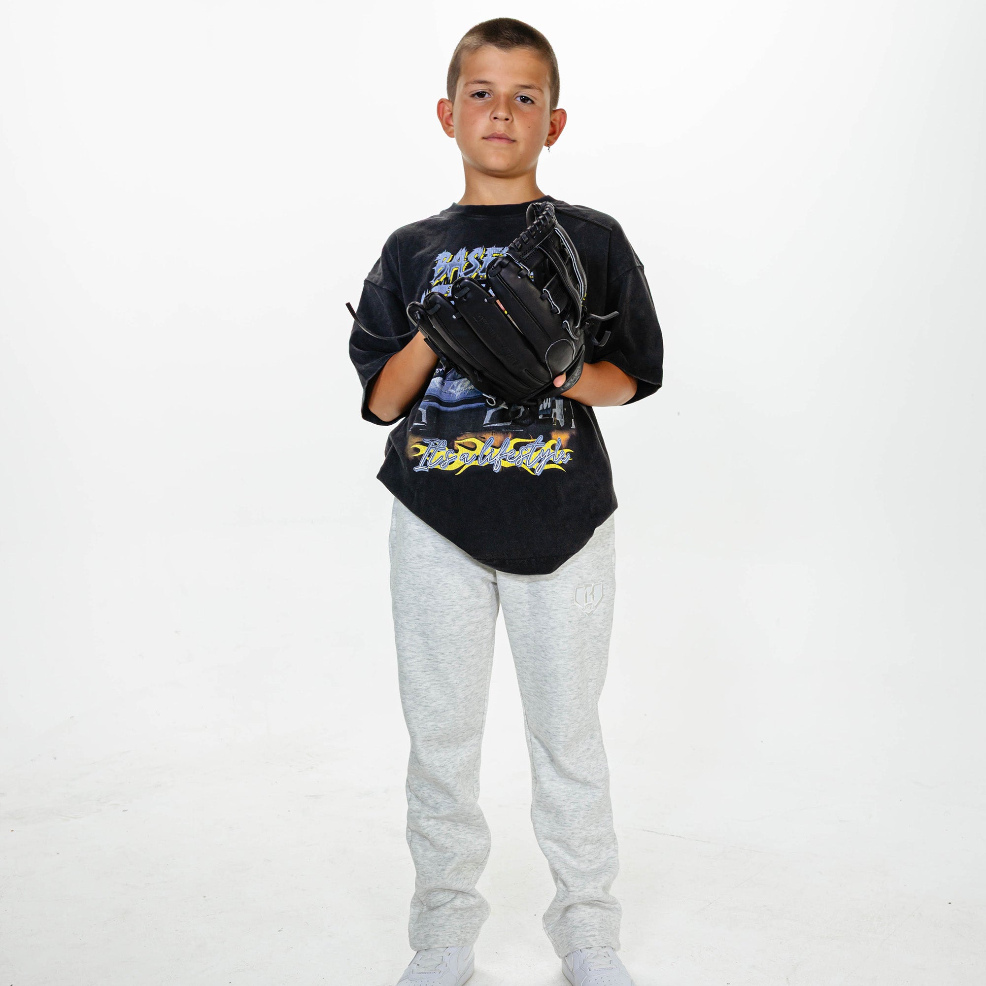 Youth model wearing Gray Baseline Straight Leg sweatpants