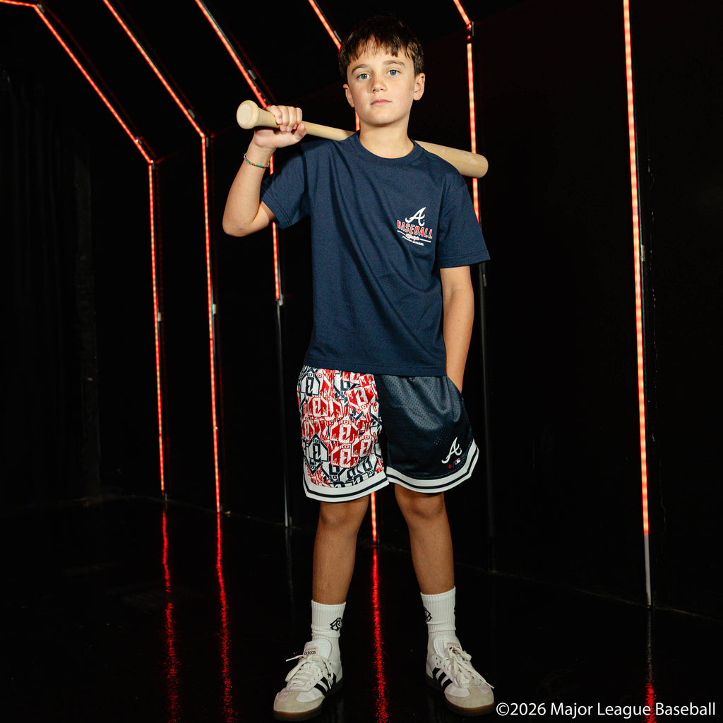 Youth model wearing navy youth graphic tee with "Atlanta Braves Ice Cream" design