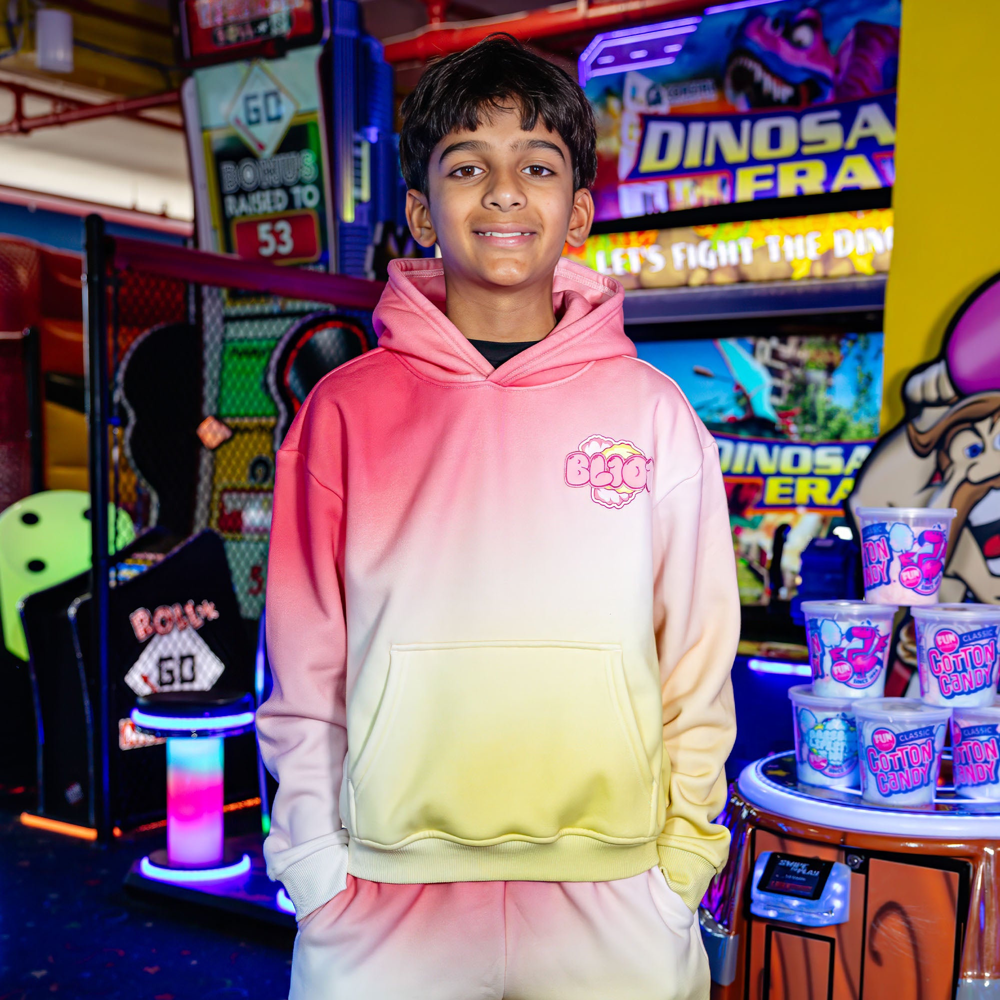 Youth model wearing Cotton Candy Pink Lemonade youth hoodie