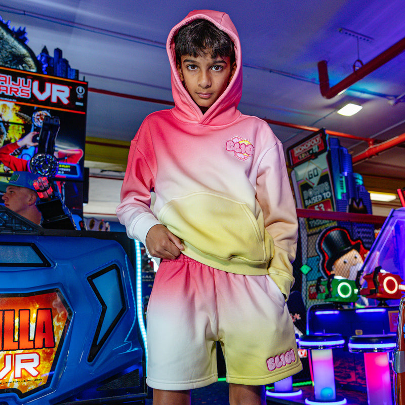 Youth model wearing Cotton Candy Pink Lemonade youth shorts