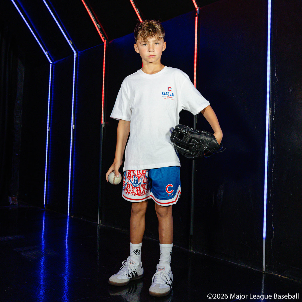 Youth model wearing white youth graphic tee with "Chicago Cubs Ice Cream" design