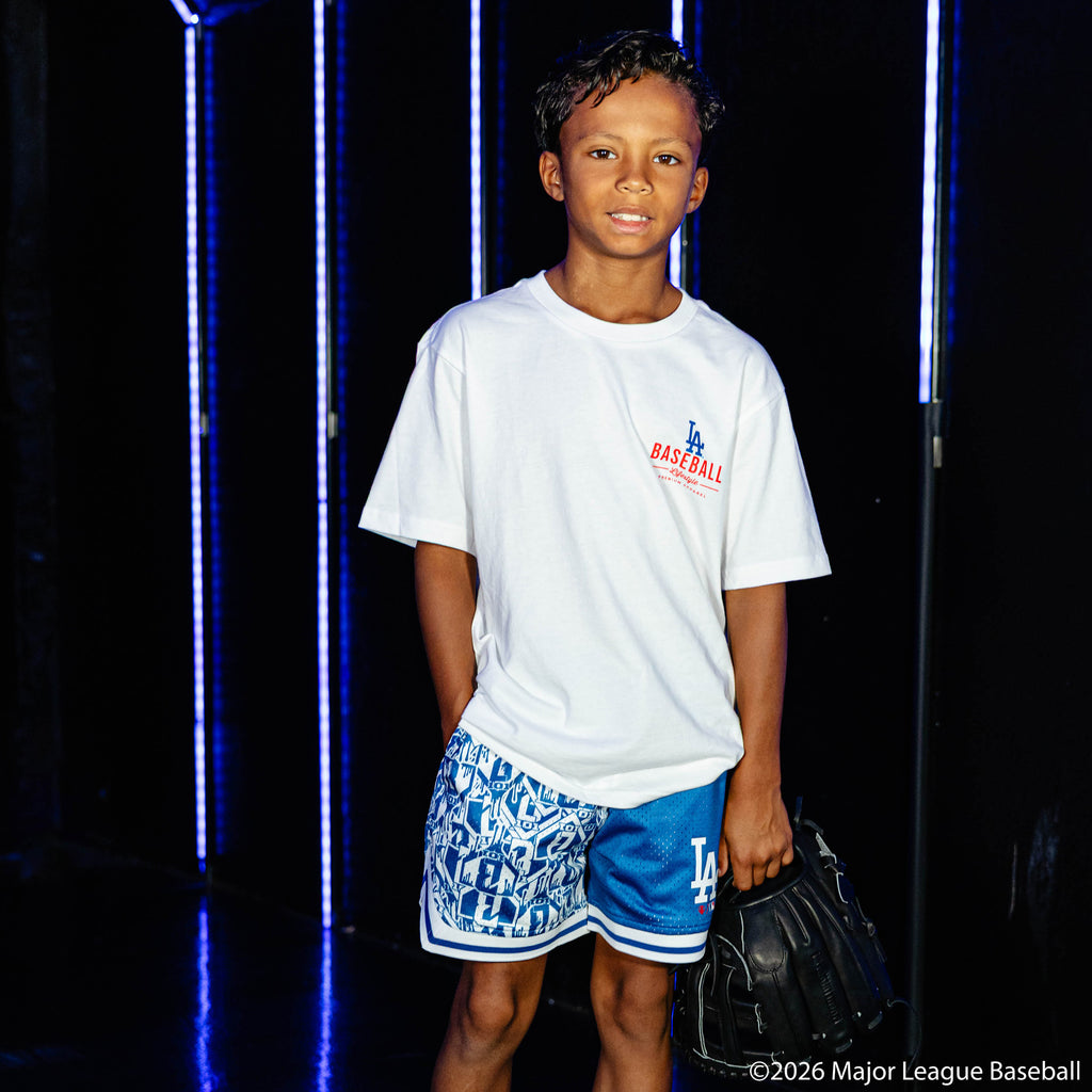 Youth model wearing white youth graphic tee with "Los Angeles Dodgers Ice Cream" design