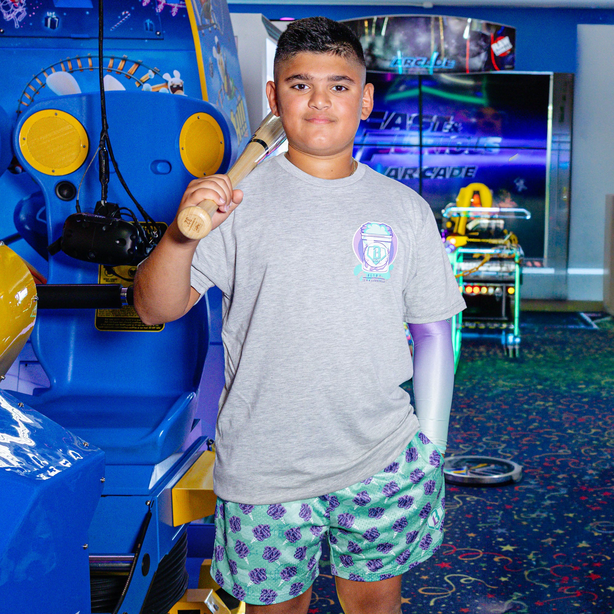 Youth model wearing Home Run Sugar Galaxy Grape youth shorts