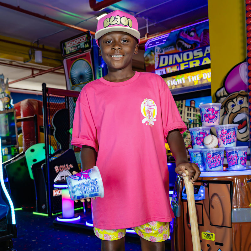 Youth model wearing Home Run Sugar Pink Lemonade youth shorts