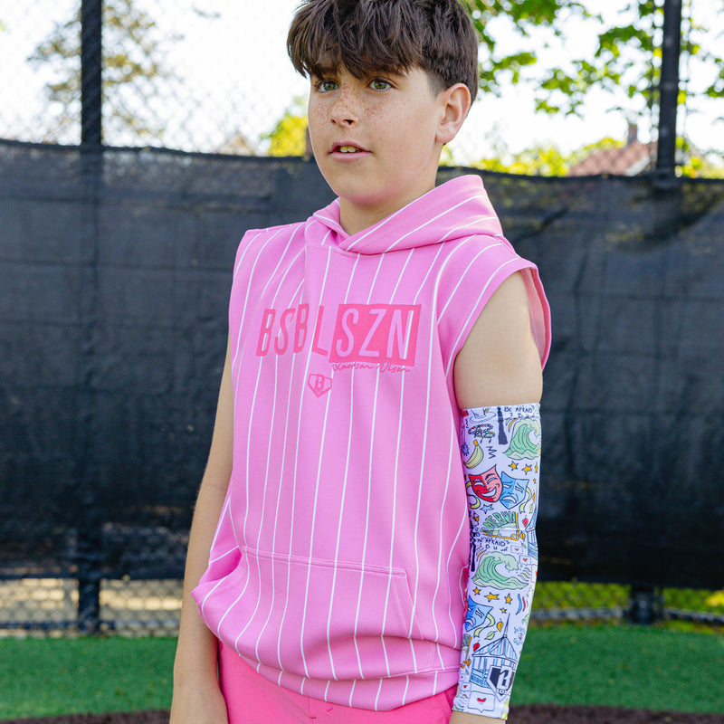 Close-up of the ribbed band and upper graphic detail on the white Jackson Olson x BL101 arm sleeve
