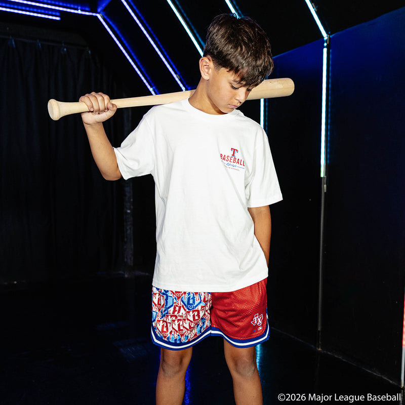 Youth model wearing red youth shorts with "Texas Rangers Sticker Court" design