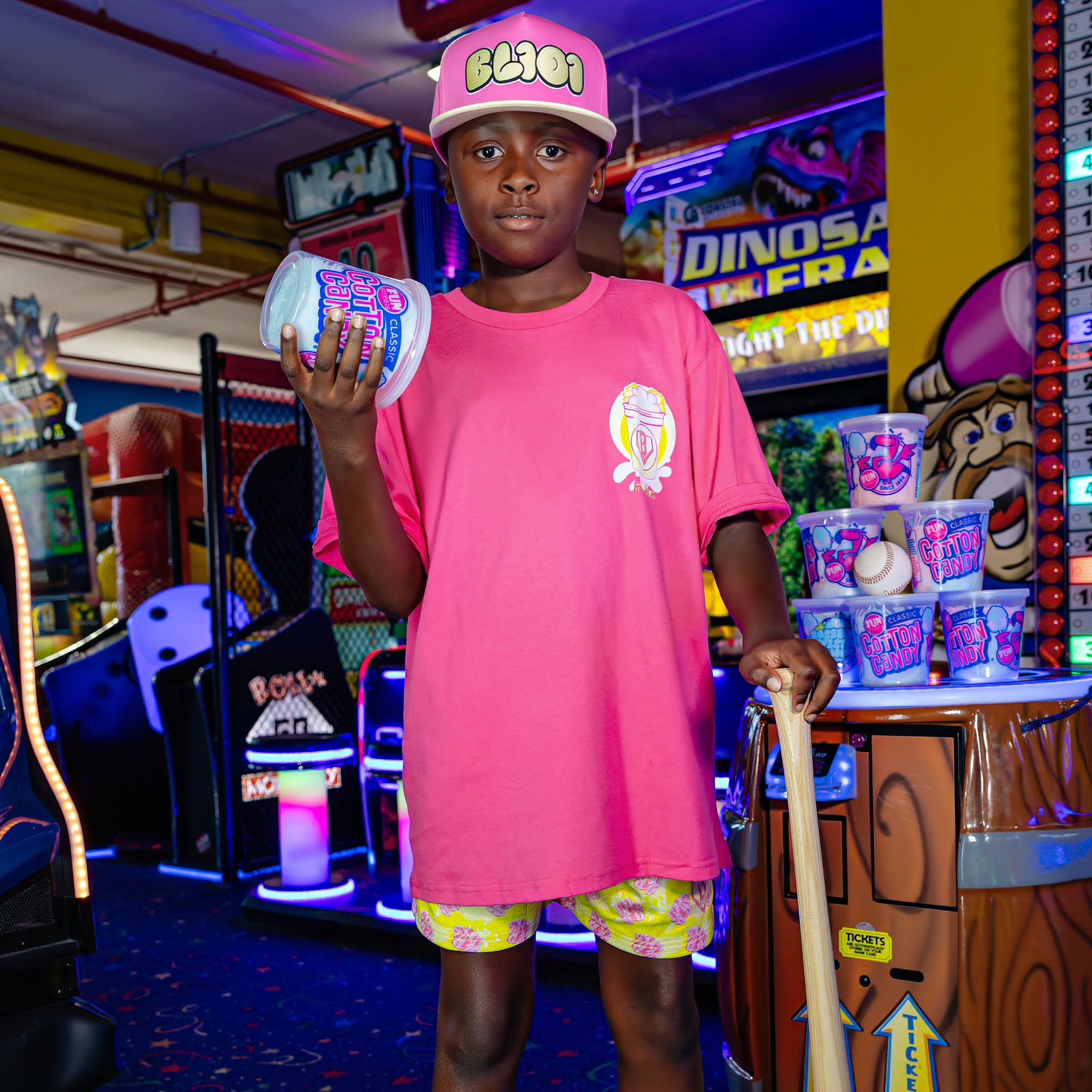Youth model wearing Sweet Spot Pink Lemonade youth graphic tee