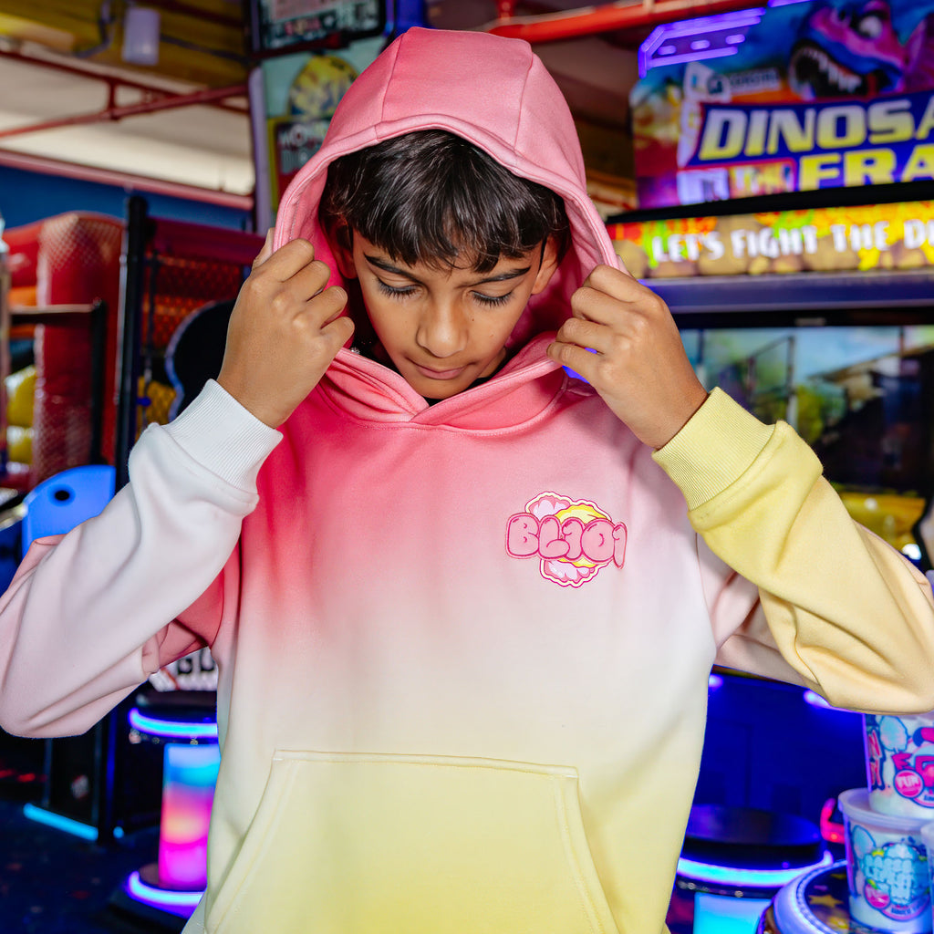 Youth model wearing Cotton Candy Pink Lemonade youth hoodie