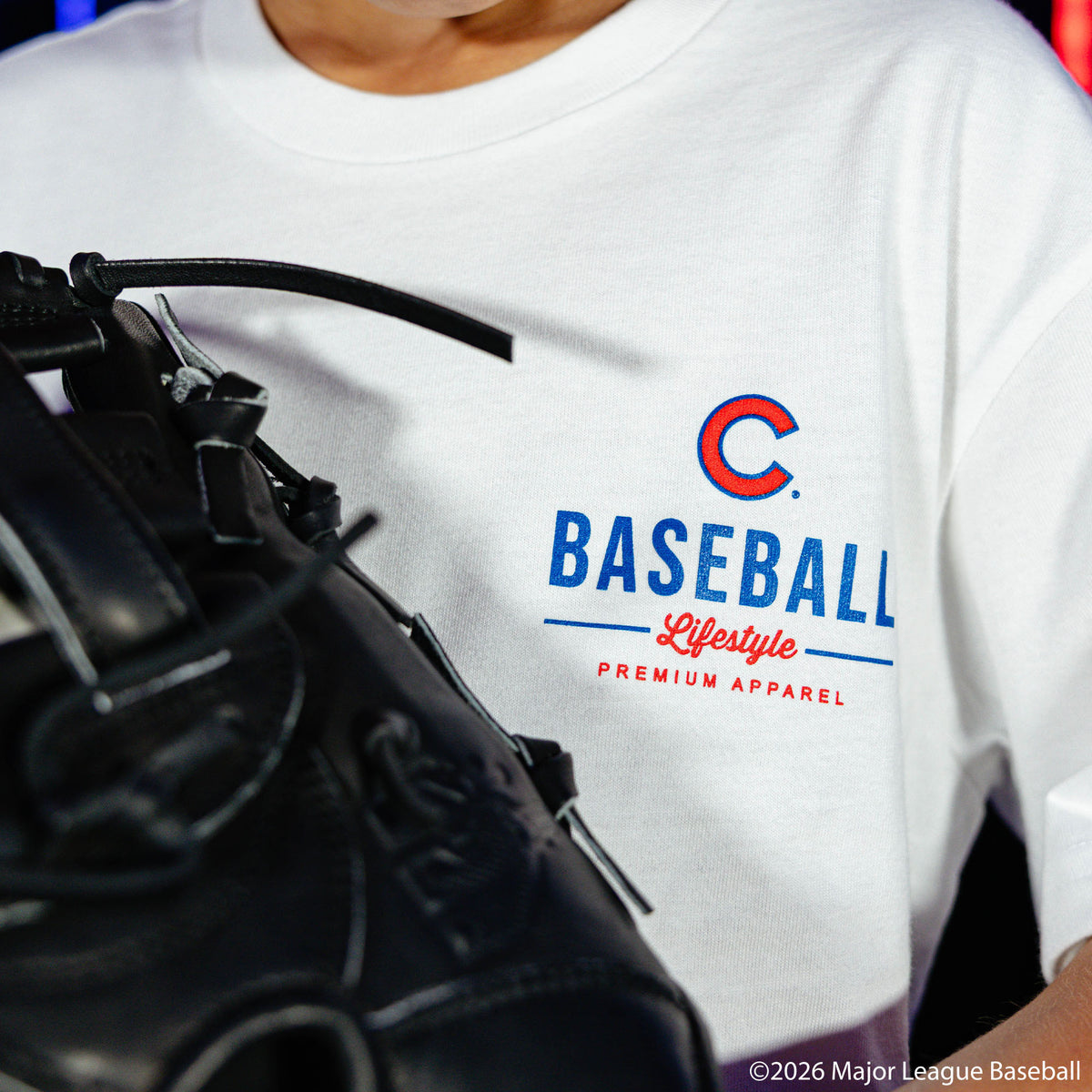 Youth model wearing white youth graphic tee with "Chicago Cubs Ice Cream" design