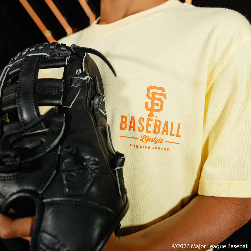Youth model wearing cream youth graphic tee with "San Francisco Giants Ice Cream" design