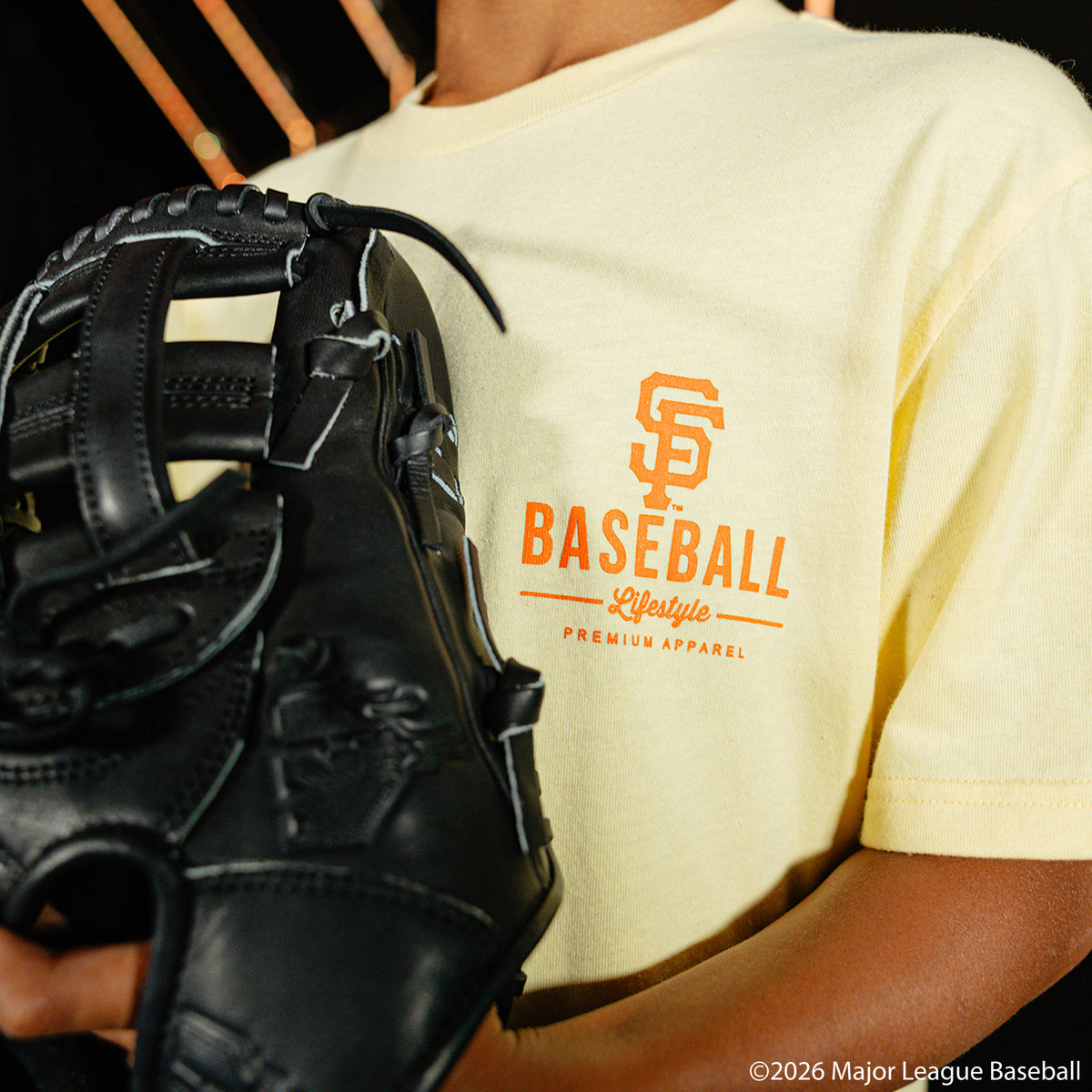 Youth model wearing cream youth graphic tee with "San Francisco Giants Ice Cream" design