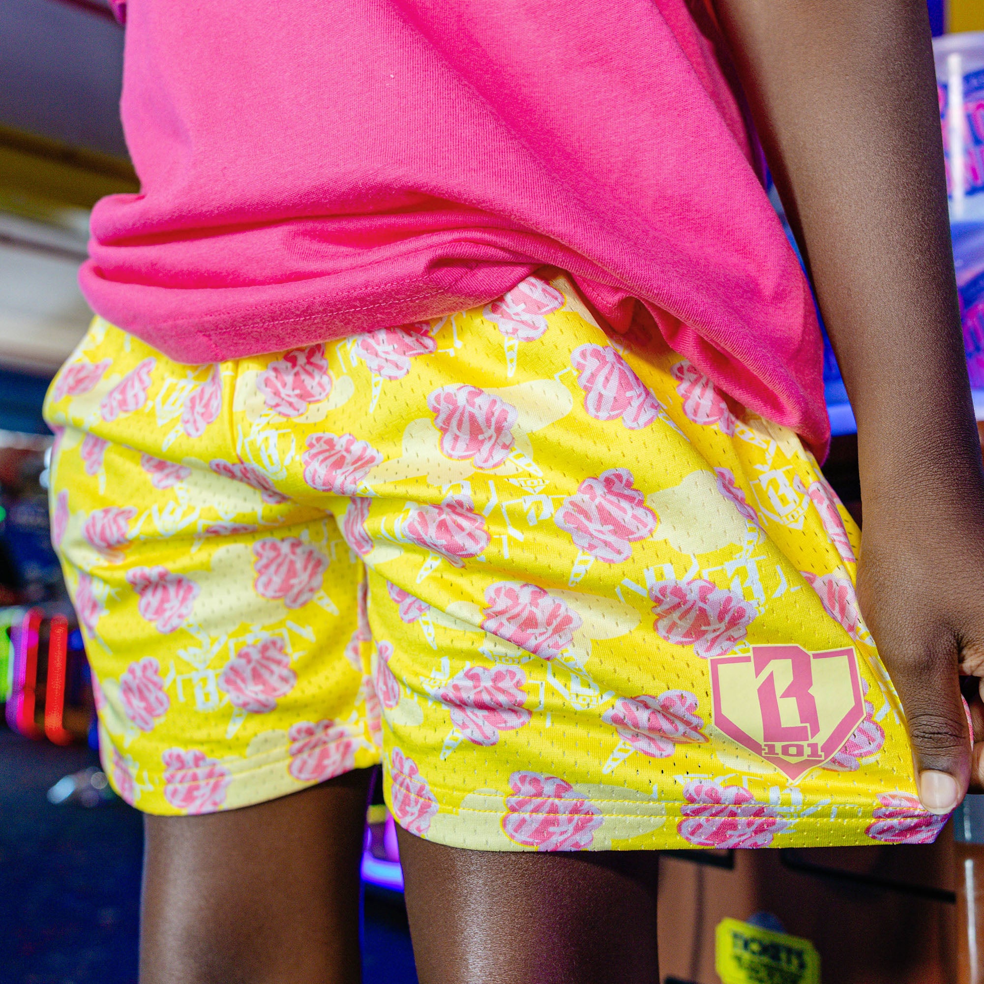 Youth model wearing Home Run Sugar Pink Lemonade youth shorts