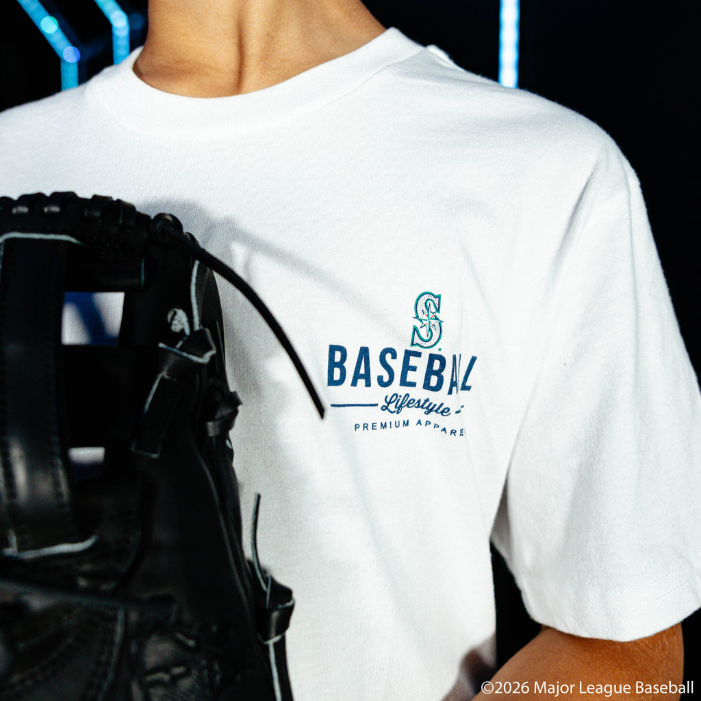 Youth model wearing white youth graphic tee with "Seattle Mariners Ice Cream Cap" design